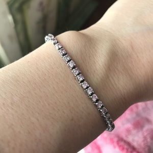 Pink stone & sterling silver tennis bracelet